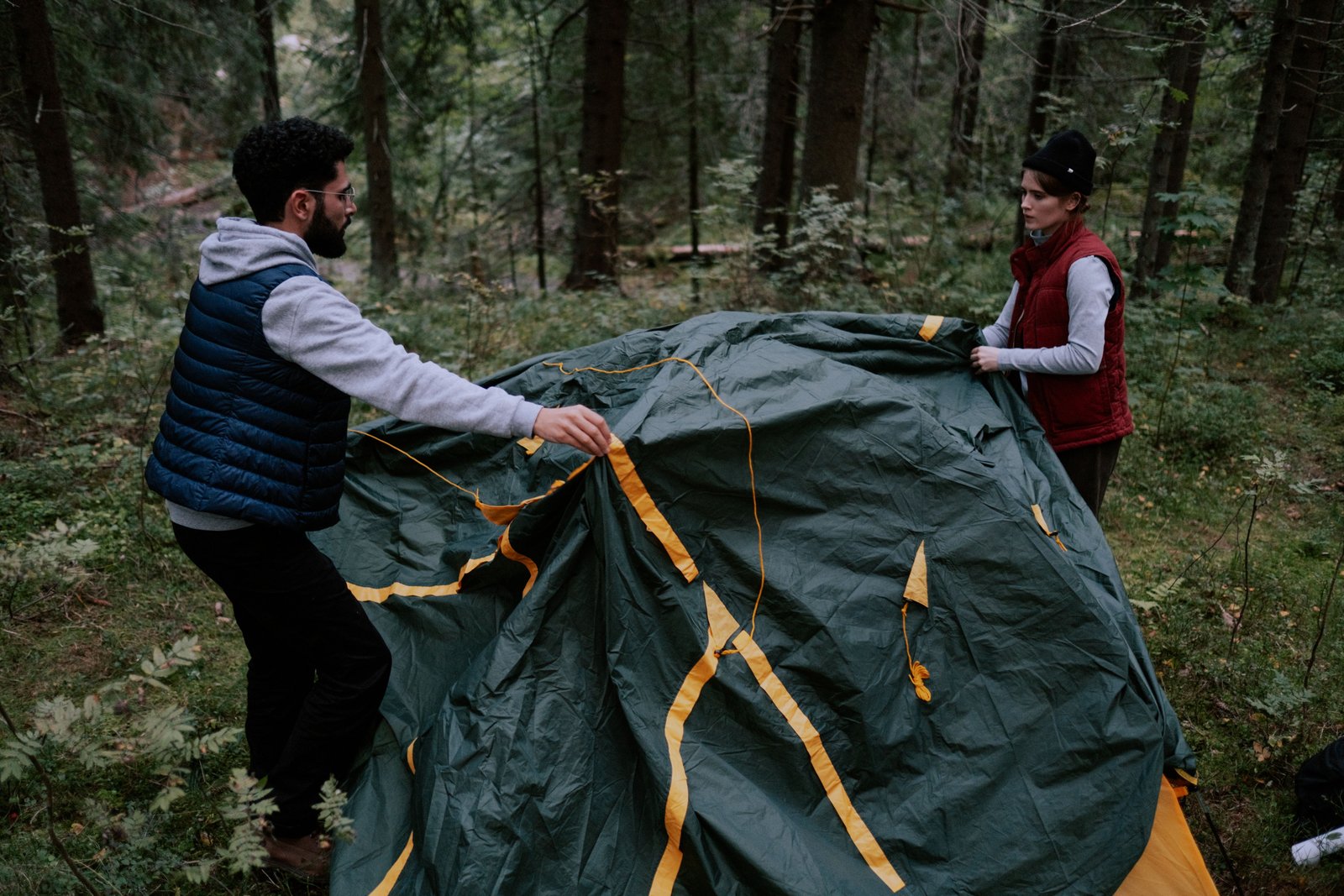 Two people mid tent set up